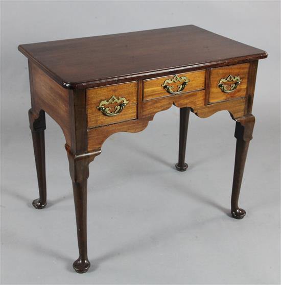 A George III mahogany lowboy, W.2ft 6in. D.1ft 7in. H.2ft 3in.